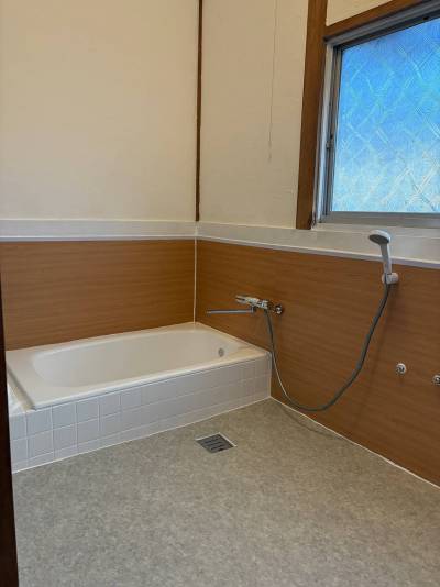 全面漆喰施工と木目調防水シート