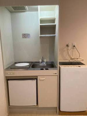 洗濯機ミニ冷蔵庫も付いている