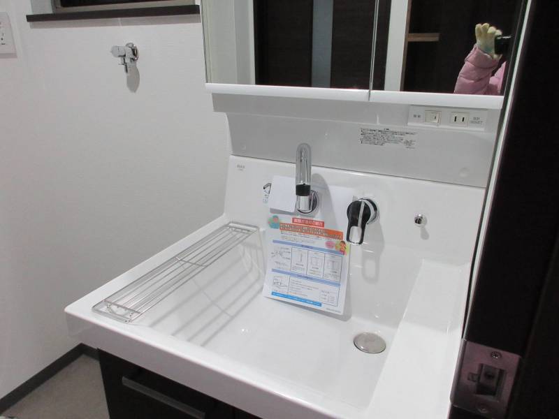 帰宅後部屋を通らずに入室できる洗面ユーティリティー。