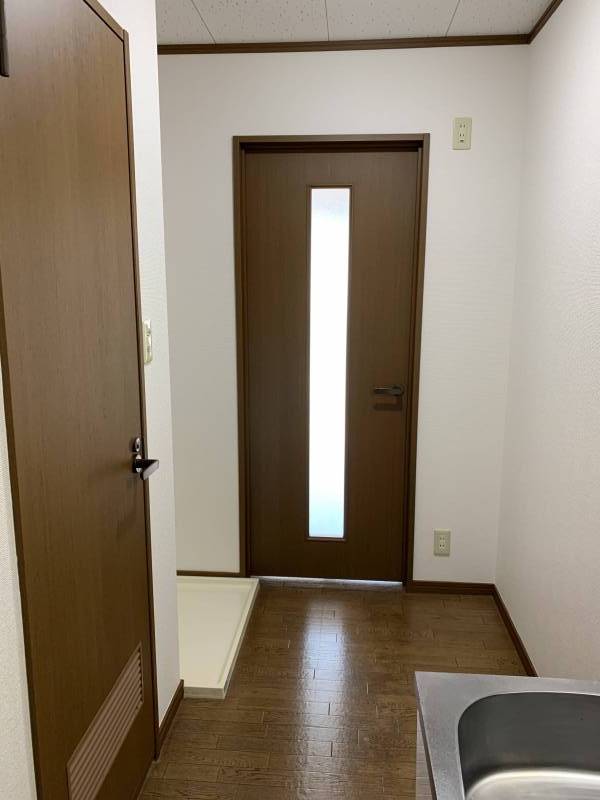 居間とキッチンの間には扉があるので冷暖房しっかり効きます。